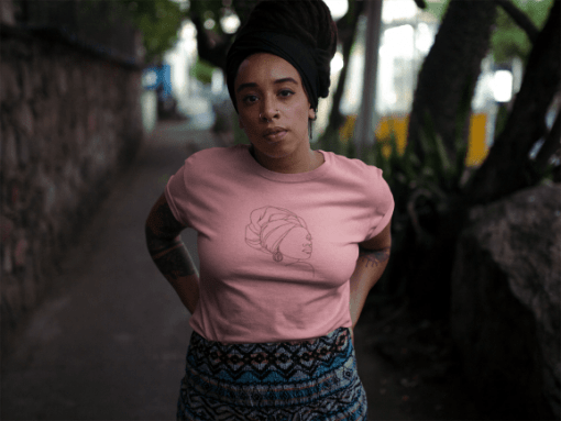 sublimated round neck tee a black girl with dreadlocks Designs with a unique blend of culture and style. Rasta vibes, Afro futuristic, heritage and Roots & Culture. HEADWRAP