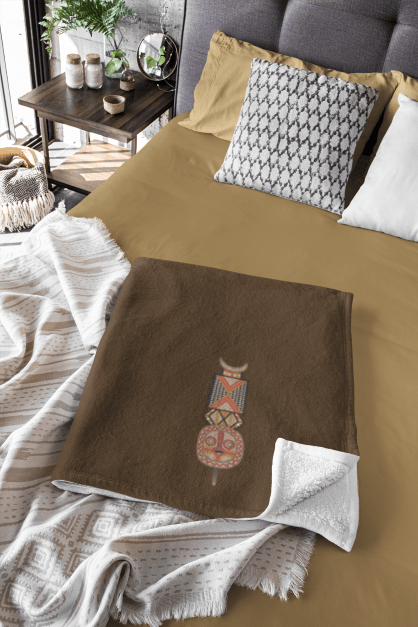 mockup of a folded blanket on a fresh bed 31316 AFROCENTRIC EMBROIDERY DESIGNS AFRICAN