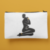 mockup of a pouch laying flat over a customizable background 29974 AFROCENTRIC EMBROIDERY DESIGNS DEFIANCE