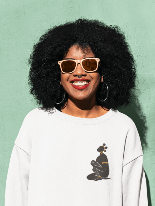 sweatshirt mockup of a happy woman with sunglasses posing against a colored wall 44676 r el2 AFROCENTRIC EMBROIDERY DESIGNS Goddess
